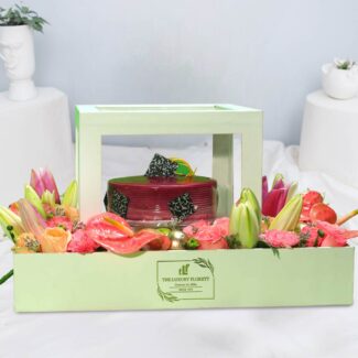 cake box bouquet of roses, lilies, anthurium, limonia and daisies