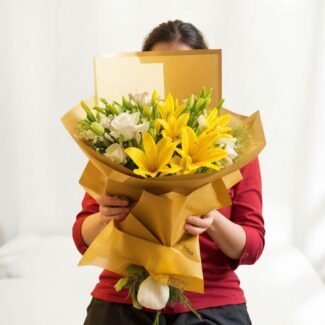 white roses and yellow lilies bouquet